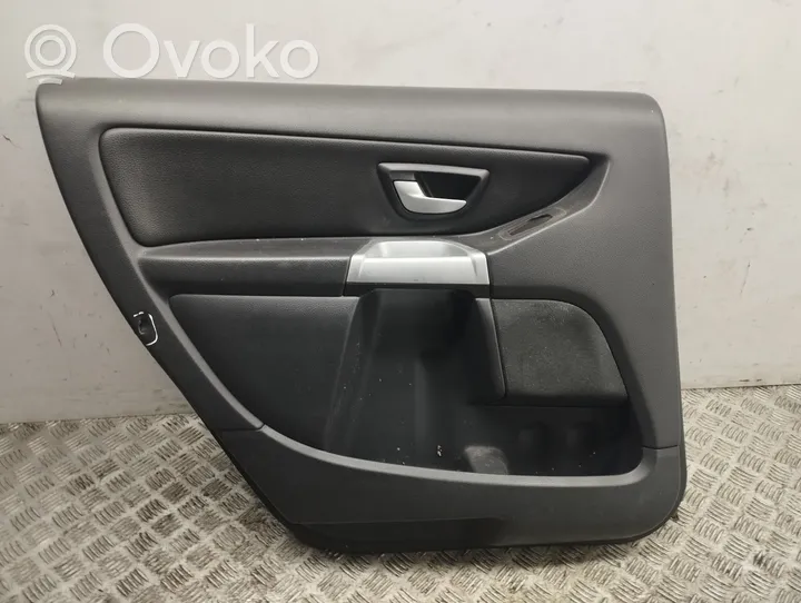 Volvo XC90 Garniture de panneau carte de porte avant 39995385