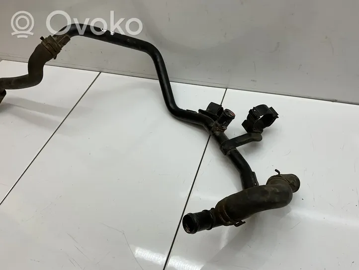 Volkswagen Golf VII Engine coolant pipe/hose 5Q0121051B