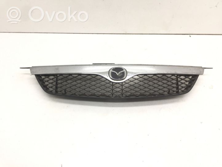 Mazda 323 Grille calandre supérieure de pare-chocs avant 