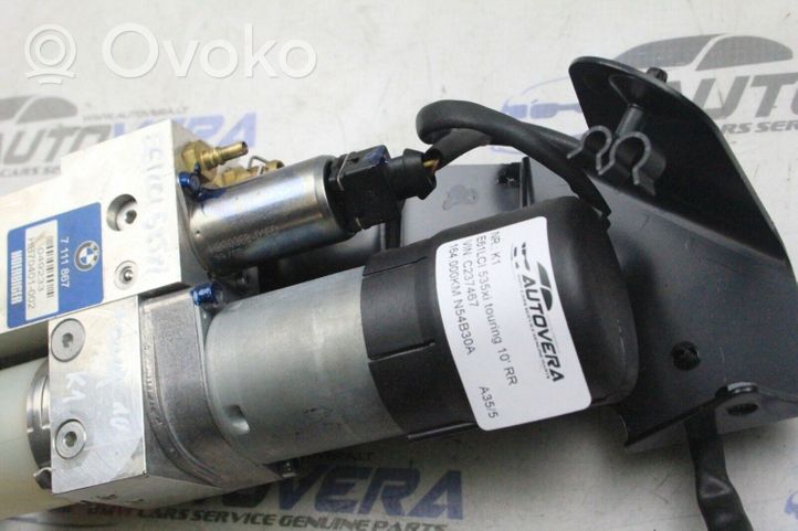 BMW 5 E60 E61 Moteur de pompe hydraulique de hayon 7111867