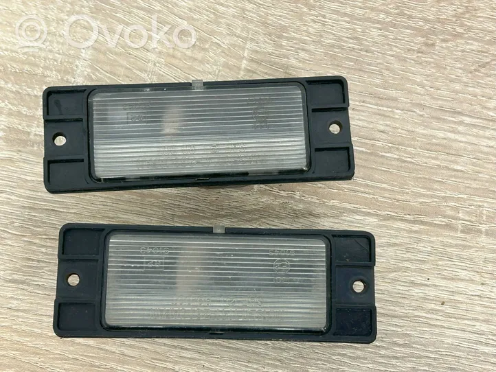 Mitsubishi Pajero Sport I Lampa oświetlenia tylnej tablicy rejestracyjnej 1141261