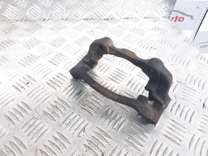 Volkswagen PASSAT B4 Plaquette / support d'étrier avant 4A17