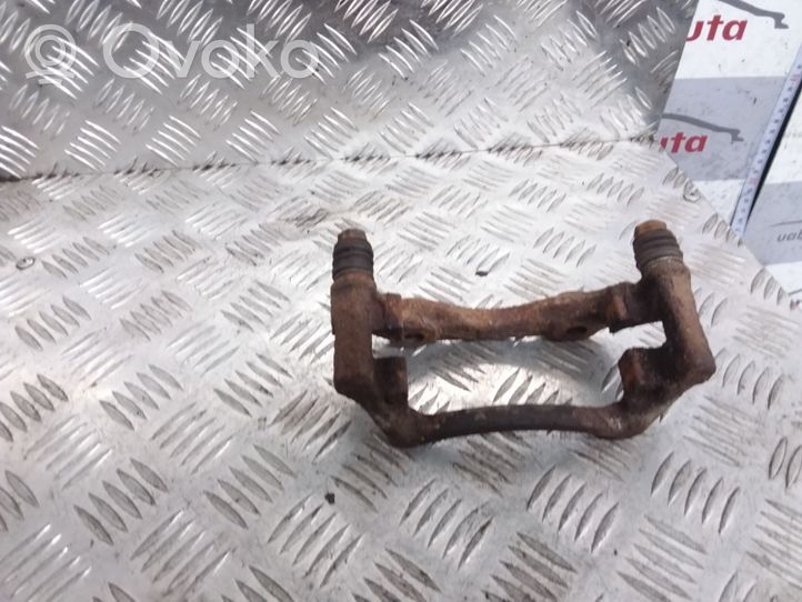 Audi 100 200 5000 C3 Supporto della pinza del freno anteriore 