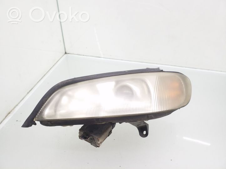 Opel Omega B2 Lampa przednia 00745711