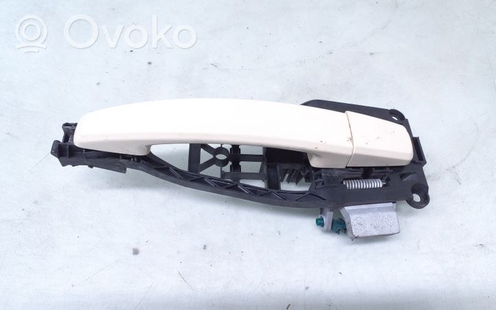 Opel Zafira B Klamka zewnętrzna drzwi przednich 24463524