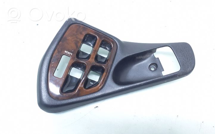 Subaru Legacy Front door window switch trim 94110AC750