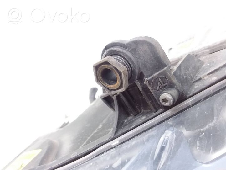 Volkswagen Golf V Lampa przednia 1K6941032