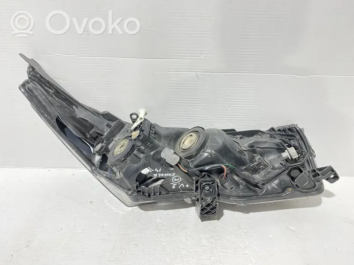 Toyota Corolla E160 E170 Lampa przednia 8115002E70