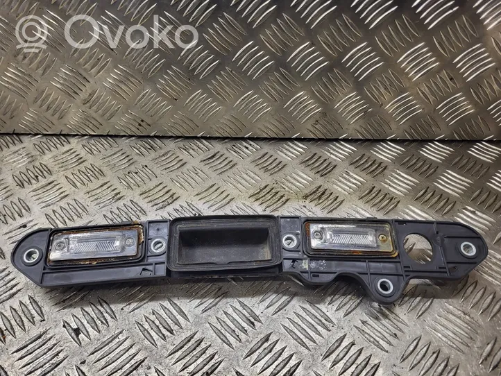 Volkswagen Touran I Trunk door license plate light bar 019033