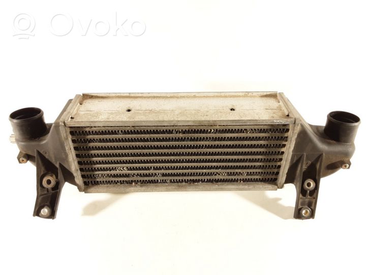 Ford Focus Starpdzesētāja radiators XS4Q9L440BD