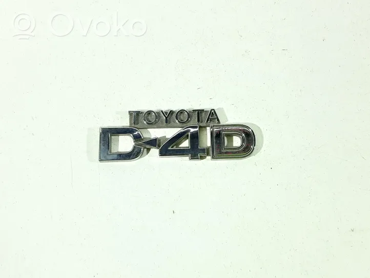 Toyota Corolla E120 E130 Logo parafango 