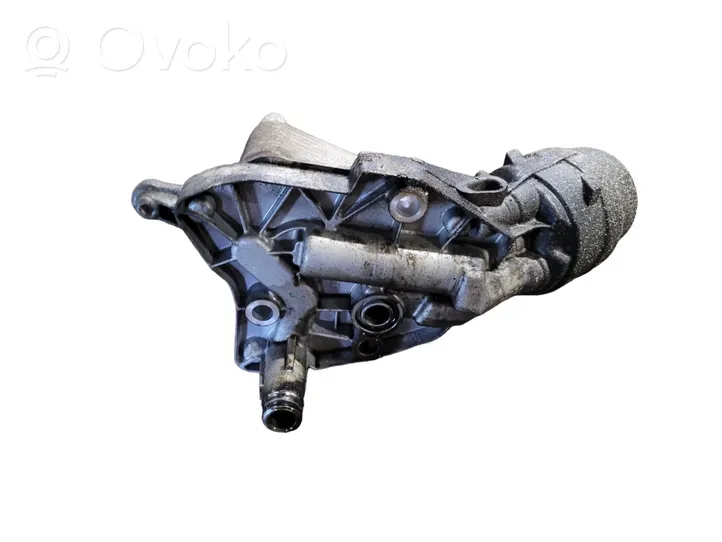 Opel Astra J Supporto di montaggio del filtro dell’olio 00055578737