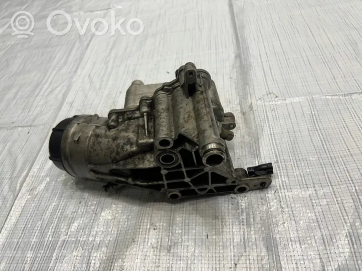 Jeep Cherokee Soporte de montaje del filtro de aceite 55246619