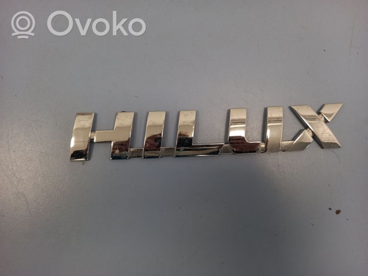 Toyota Hilux (AN10, AN20, AN30) Mostrina con logo/emblema della casa automobilistica 75427