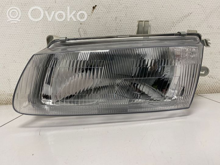 Mazda 323 Lampa przednia 082161126M