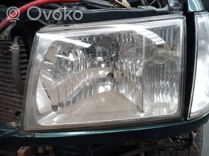 Toyota Land Cruiser (J100) Lampa przednia 6067606160696079