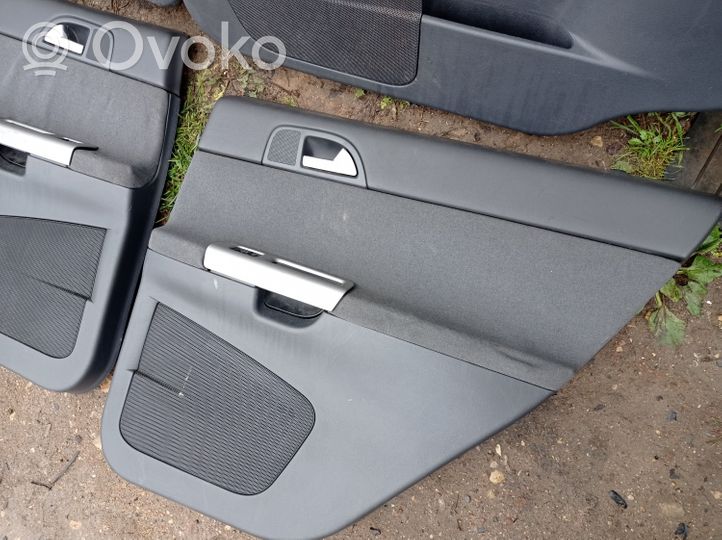 Volvo V50 Conjunto de molduras del tarjetero de la puerta 