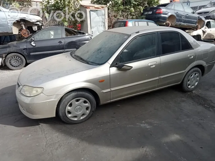 Mazda 323 Poignée inférieure de porte avant 