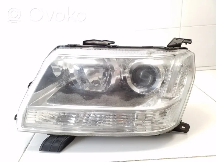 Suzuki Grand Vitara II Faro/fanale KOITO10059079