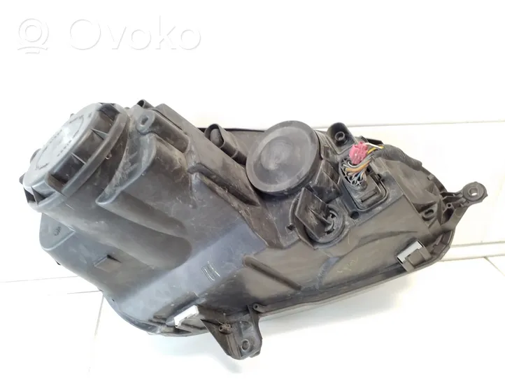 Volkswagen Golf V Lampa przednia 1K6941005P