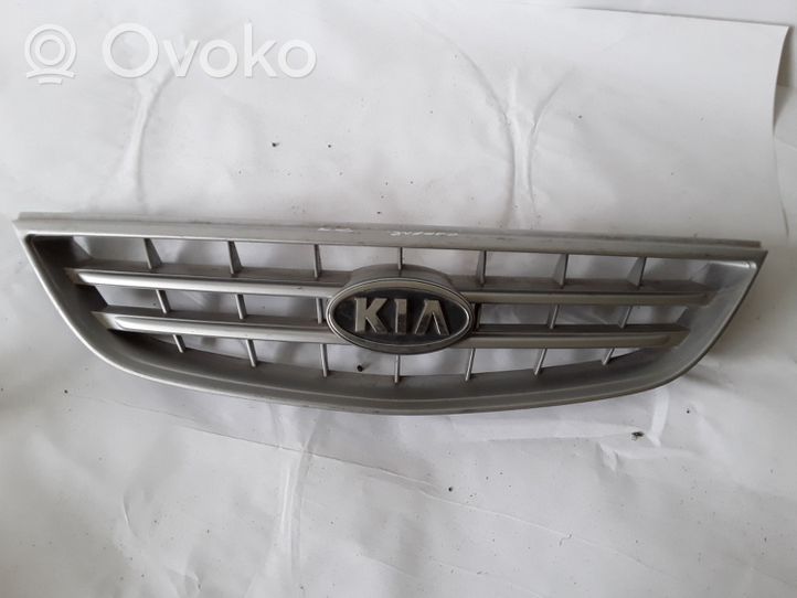 KIA Carens I Griglia superiore del radiatore paraurti anteriore 0K2EF50710