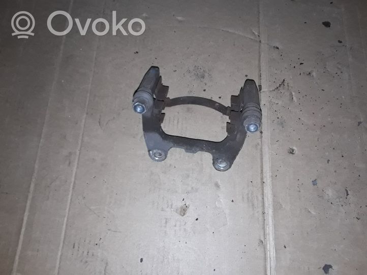 Skoda Superb B6 (3T) Brake caliper pad carrier rear 9225E