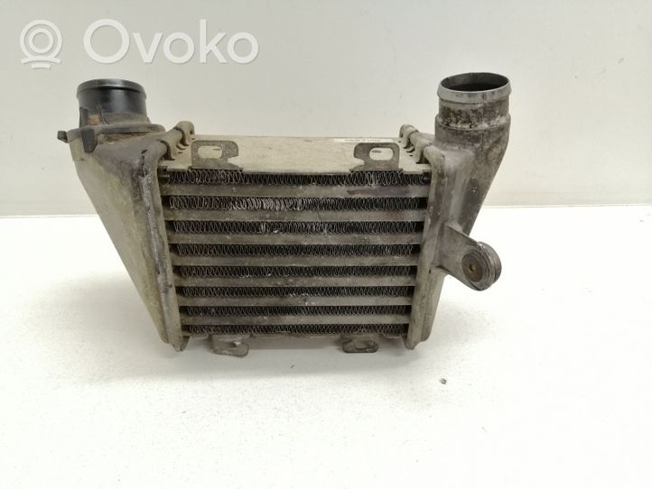 Volkswagen Golf III Intercooler radiator 1H0145805A