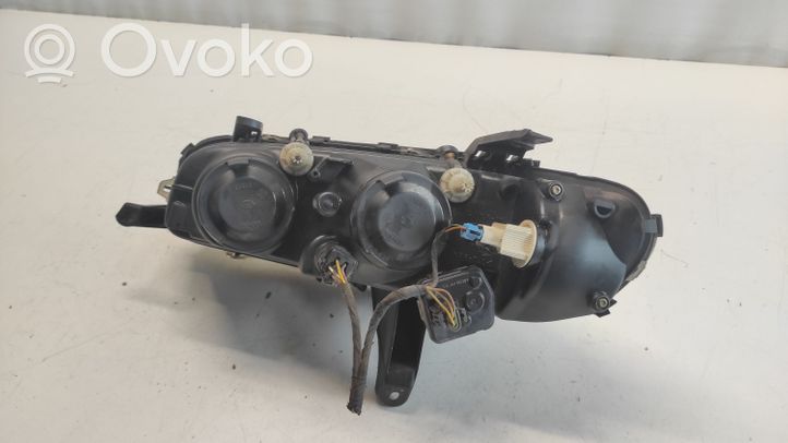 Opel Omega B1 Lampa przednia 8GH002089231