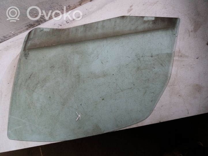 Mitsubishi Colt Front door window glass four-door 43R00048