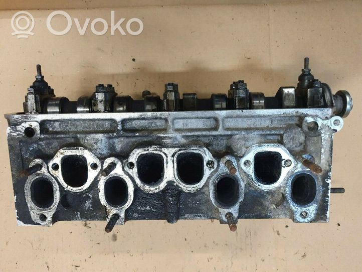 Volkswagen Golf III Engine head 028103373N