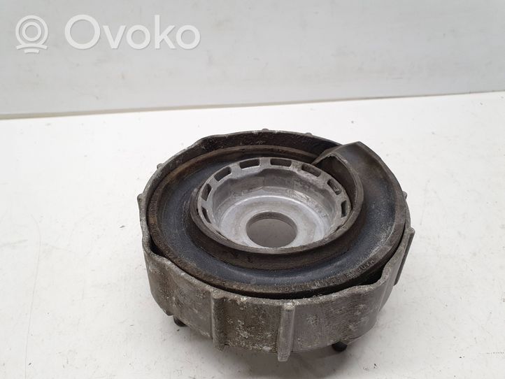 Volkswagen Touareg I Rear coil spring rubber mount 