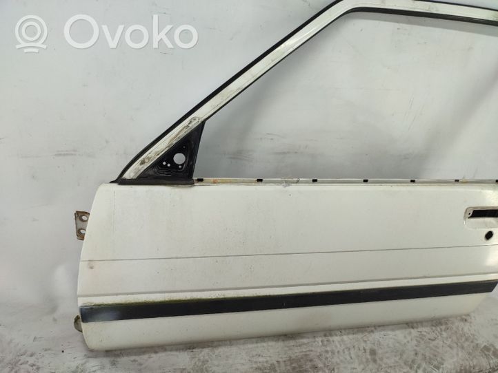 Toyota Corolla E80 Drzwi przednie 