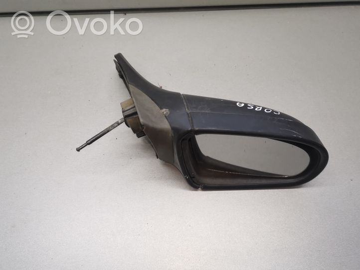 Opel Corsa B Manualne lusterko boczne drzwi przednich 090428136