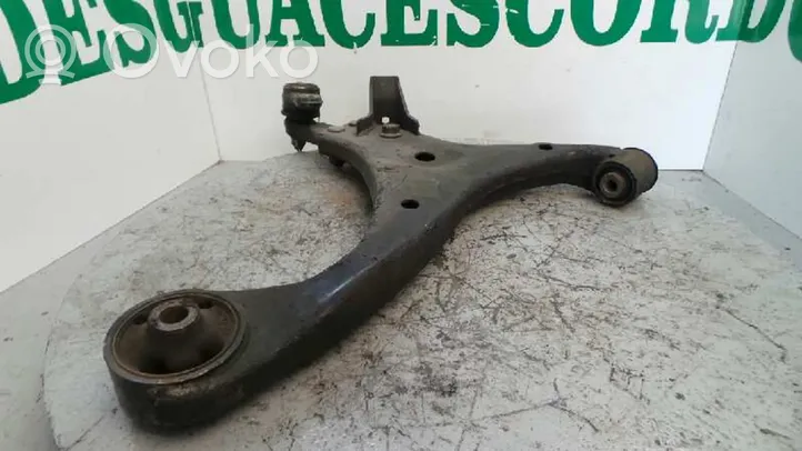 KIA Carens II Front control arm 