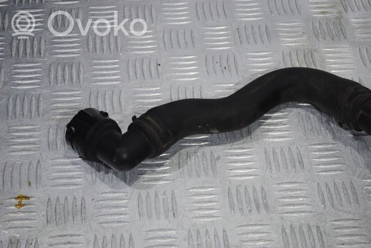 Volkswagen Polo Tubo flessibile del liquido di raffreddamento del motore 6Q0122101AK