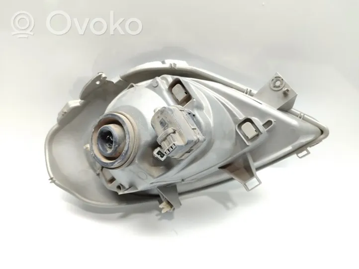 Opel Vivaro Lampa przednia 7700311371