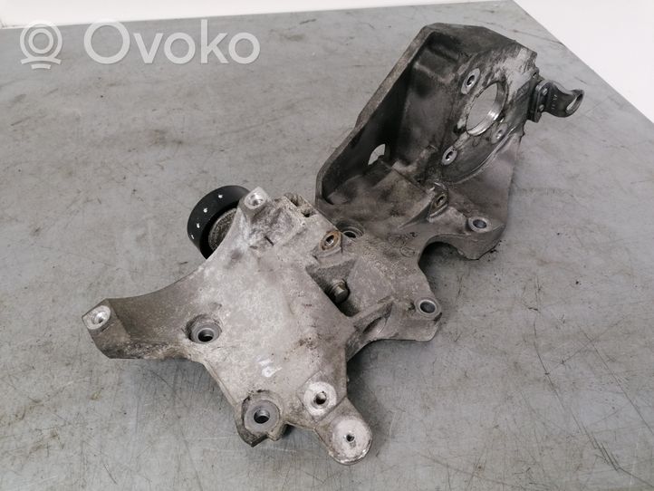 Volkswagen PASSAT CC Generator/alternator belt tensioner 03L903143Q