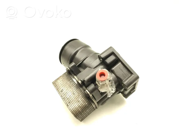 Volkswagen Touran II Supporto di montaggio del filtro dell’olio 03L115389C