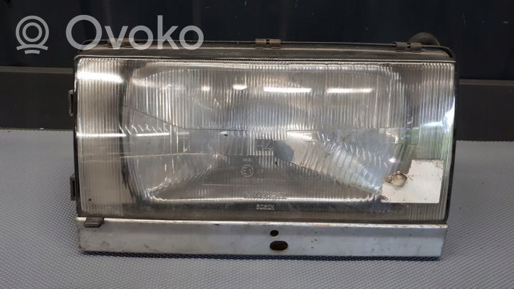Volvo 740 Lampa przednia 1305620505