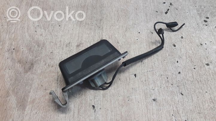 Mazda MX-3 Lampa oświetlenia tylnej tablicy rejestracyjnej 