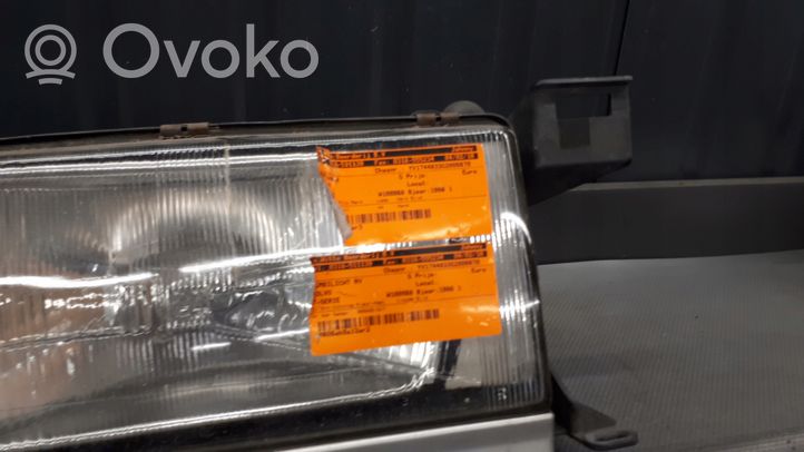 Volvo 740 Lampa przednia 1305239009
