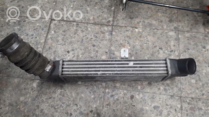 Renault 21 Chłodnica powietrza doładowującego / Intercooler 7700776825