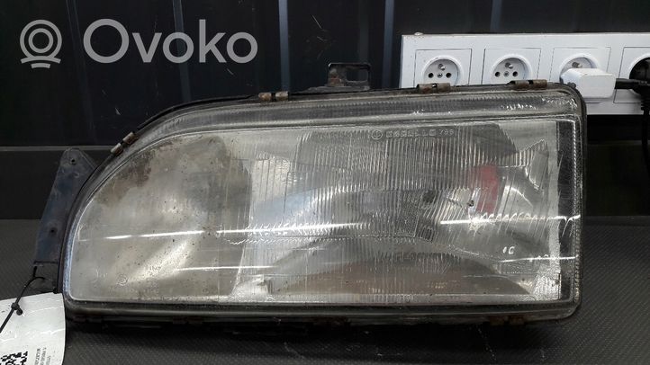 Ford Sierra Lampa przednia 87BG13N059DA