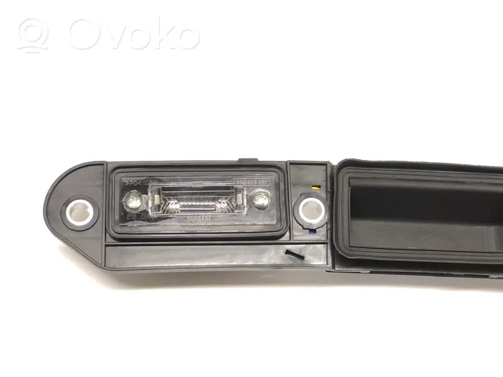 Volkswagen Jetta V Trunk door license plate light bar 1T0827574A