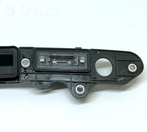 Volkswagen Touran I Trunk door license plate light bar 1T0827574A