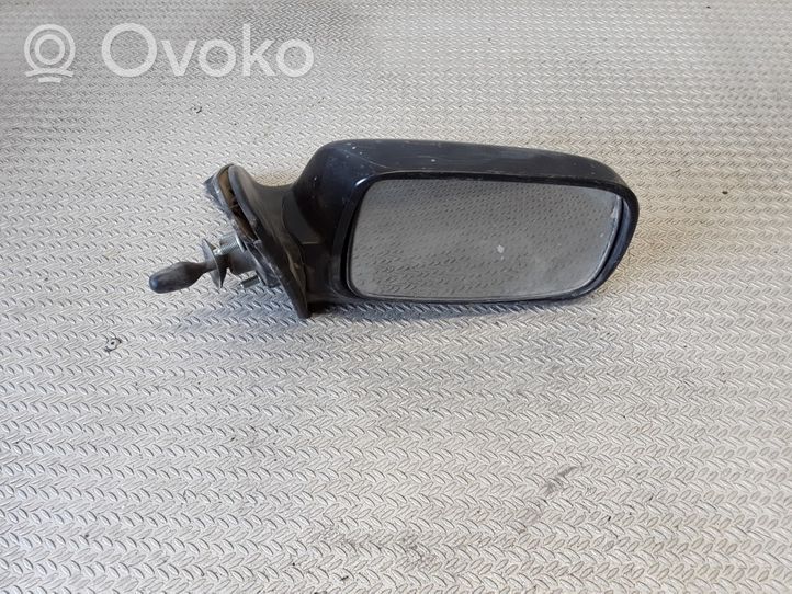 Toyota Corolla E100 Manualne lusterko boczne drzwi przednich E11015830