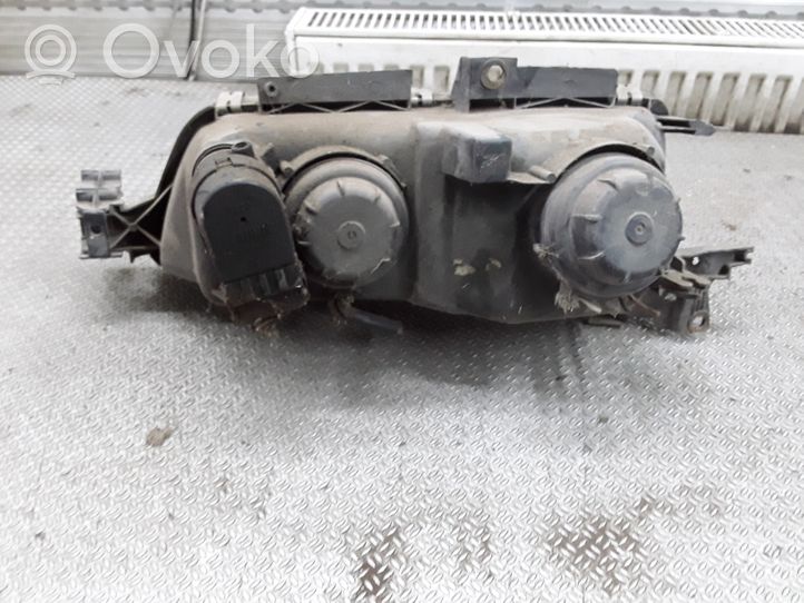 Peugeot 605 Lampa przednia 0488009