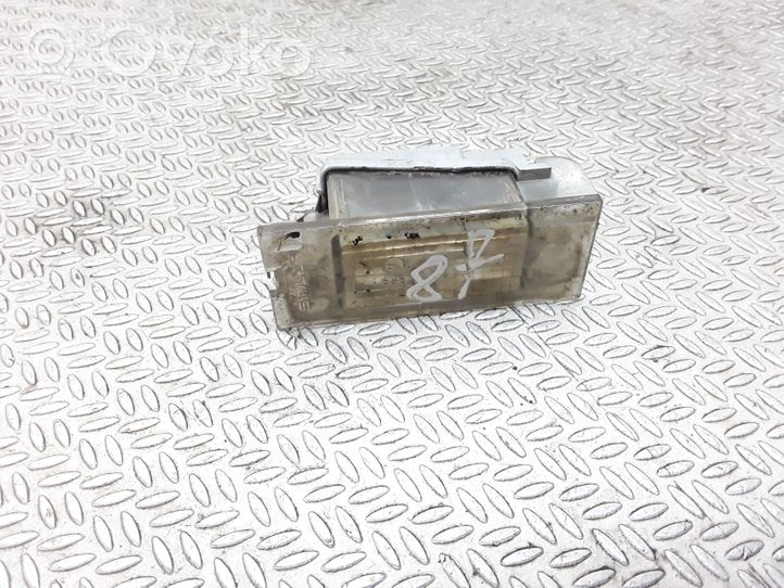 Renault Megane II Lampa oświetlenia tylnej tablicy rejestracyjnej 7700796163