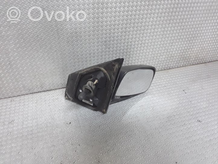 Toyota Yaris Manualne lusterko boczne drzwi przednich E1010673