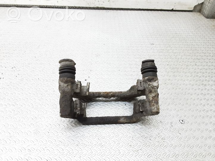 Toyota Avensis T250 Supporto della pinza del freno posteriore 